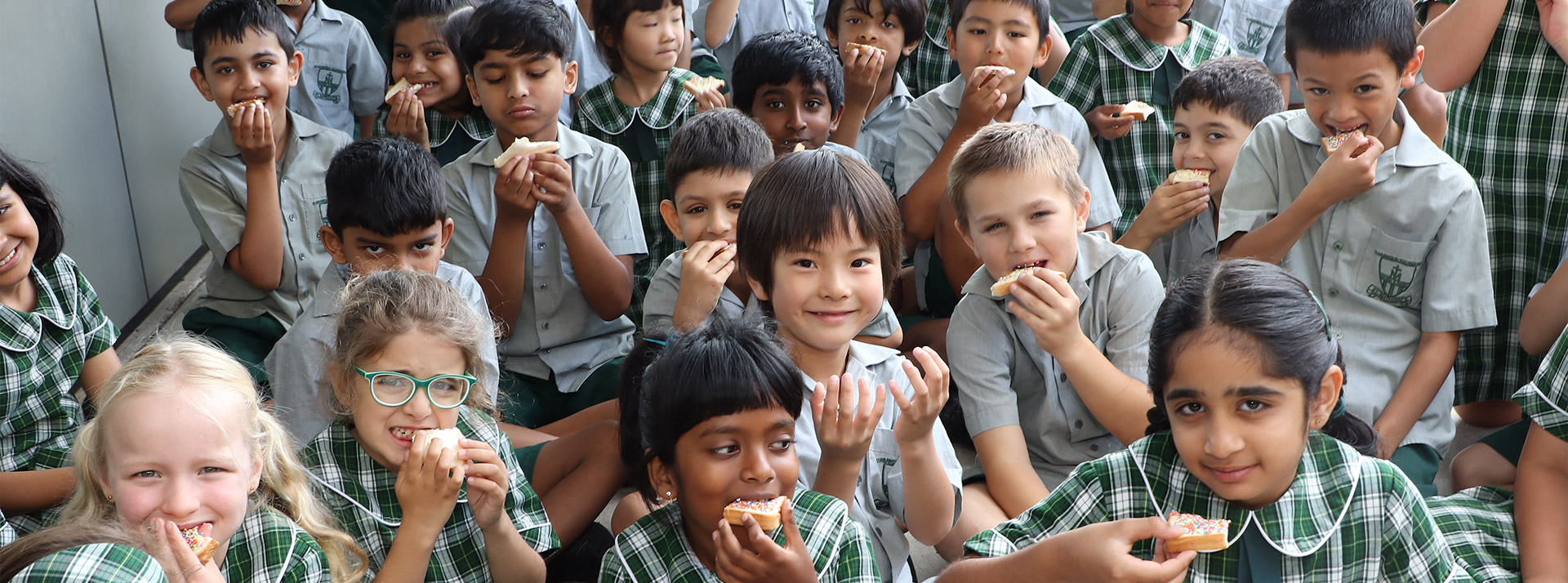St Anthony's Catholic Primary School Girraween students eating fairy bread