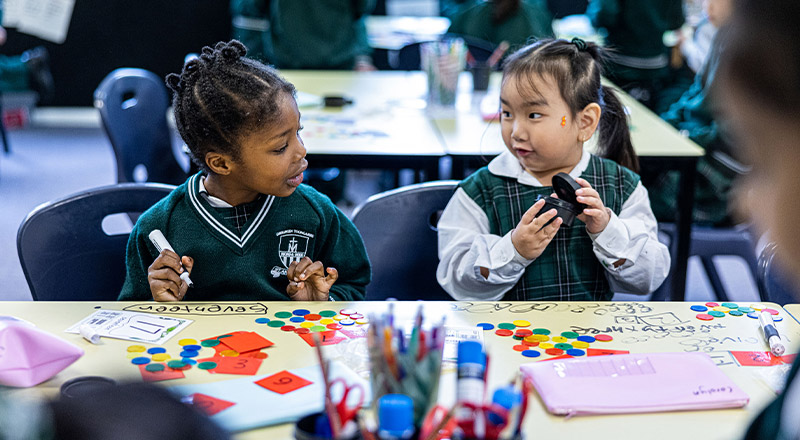 St Anthony's Catholic Primary School Girraween students learning at desk