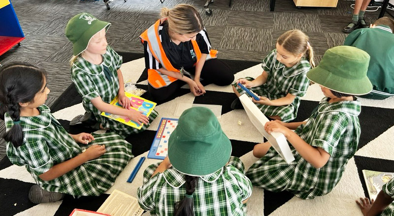 Teacher instructing students at St Anthony's Catholic Primary Girraween