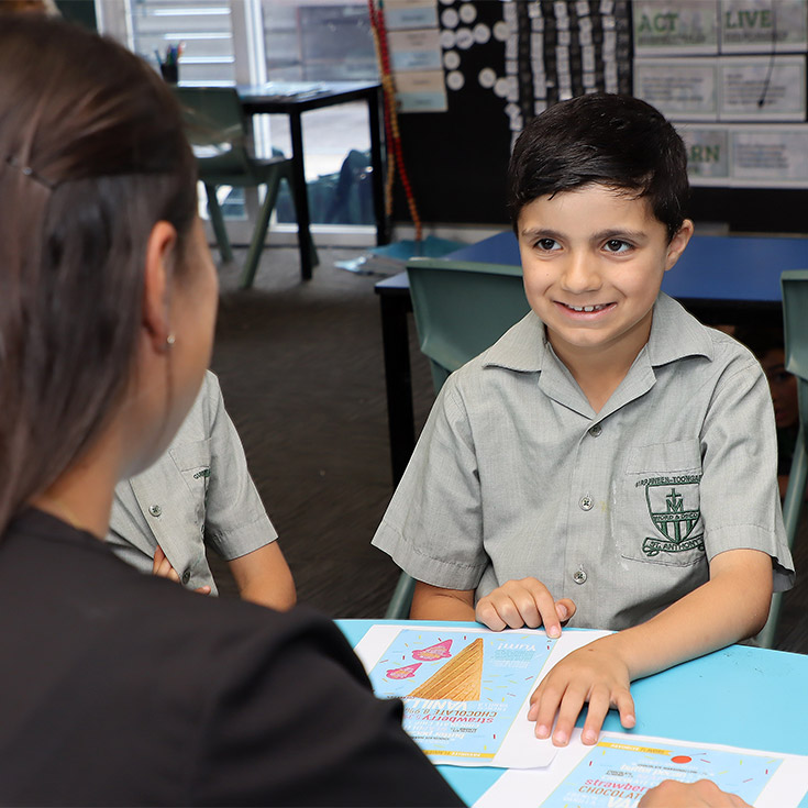 St Anthony's Catholic Primary School Girraween students learning with dedicated teacher
