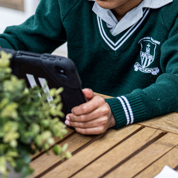 St Anthony's Catholic Primary School Girraween students learning on iPad