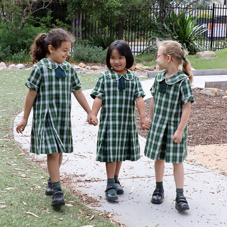 St Anthony's Catholic Primary School Girraween students walking through campus