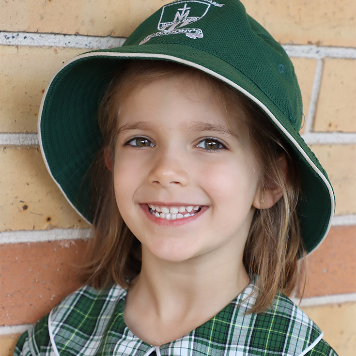 St Anthony's Catholic Primary School Girraween student showing off a hat