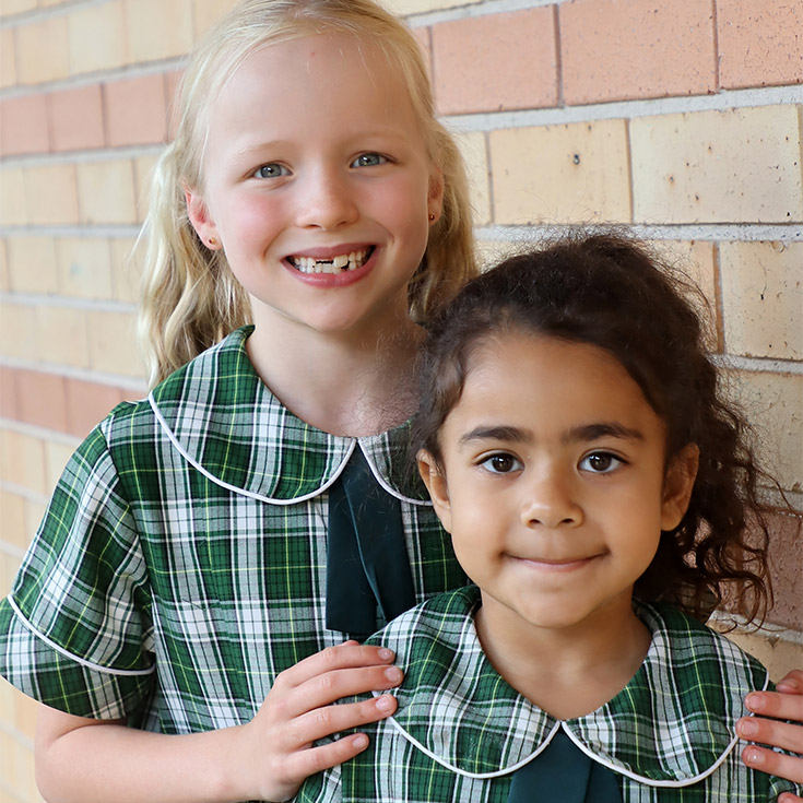 St Anthony's Catholic Primary School Girraween students smiling sweetly at camera